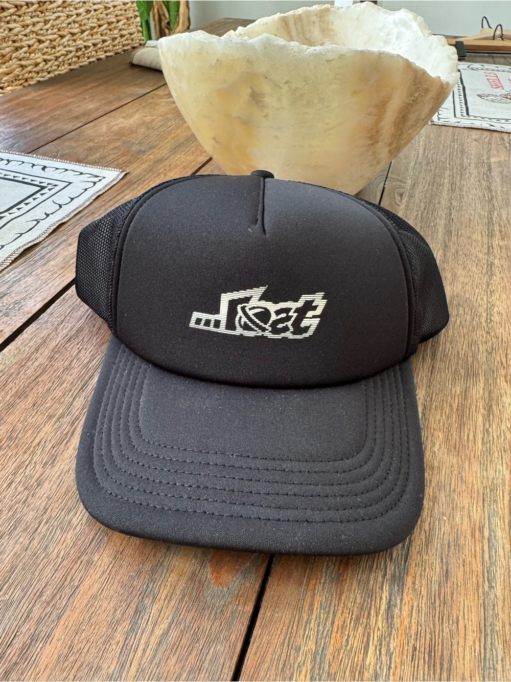 Lost Black Trucker Hat with White Embroidered Logo